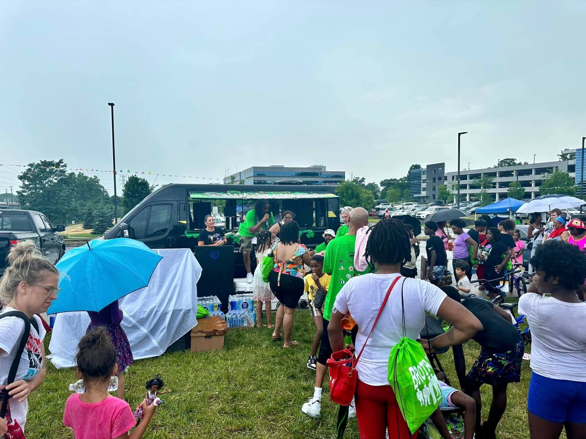 Large crowd gathered around the Shamrock mobile stage at 2nd KidsFest