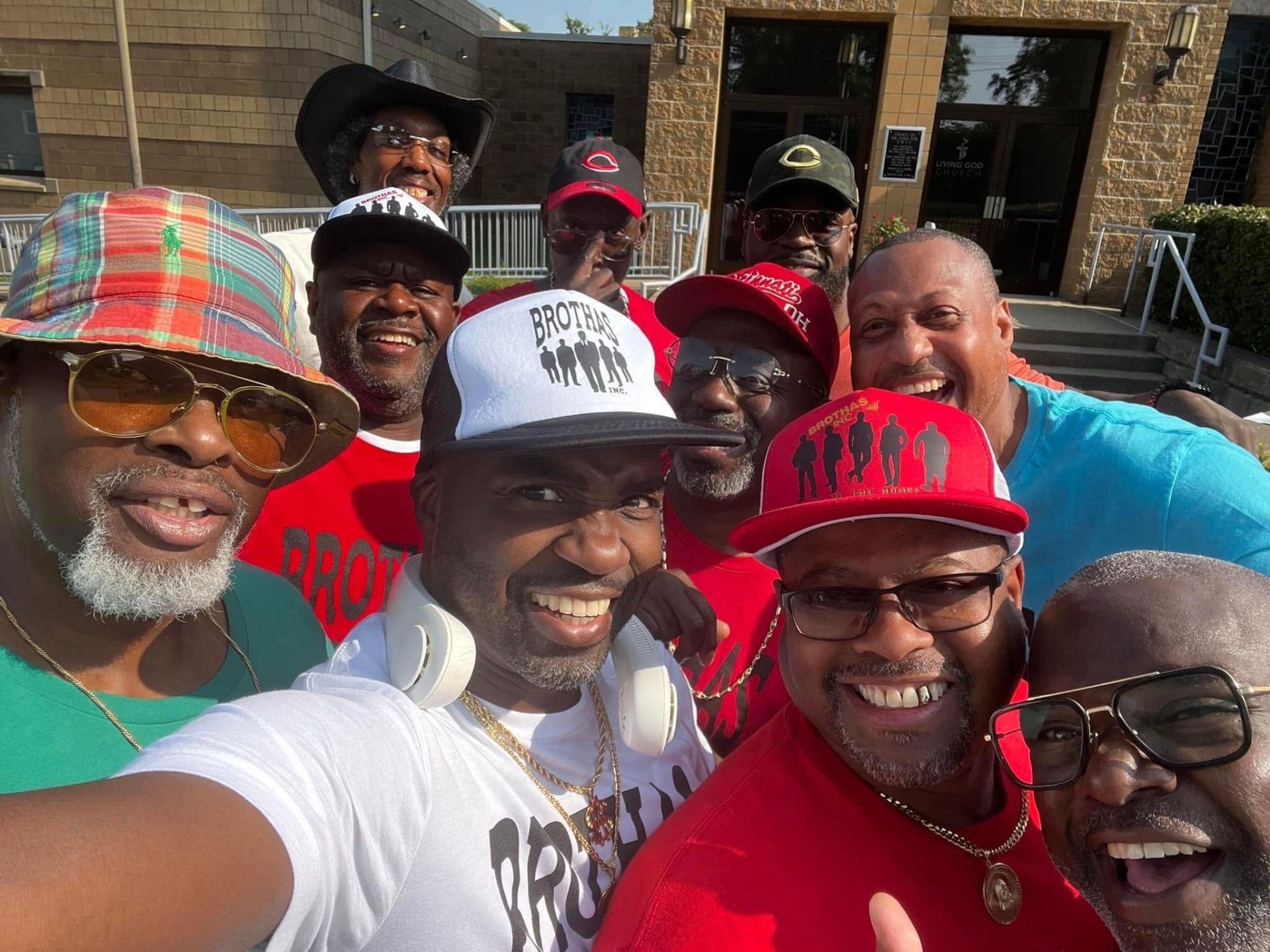 Group selfie of the Brothas Inc. crew outside Living God Church before the Black Family Reunion Parade
