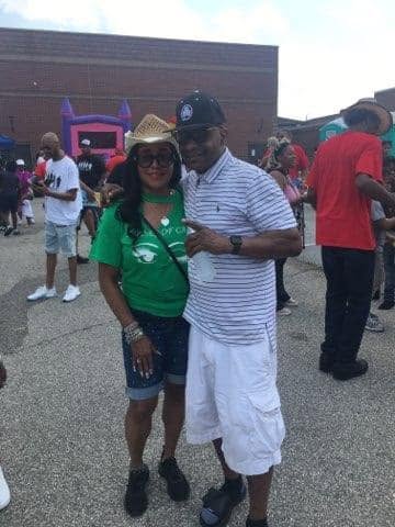 Community members posing together at KidsFest