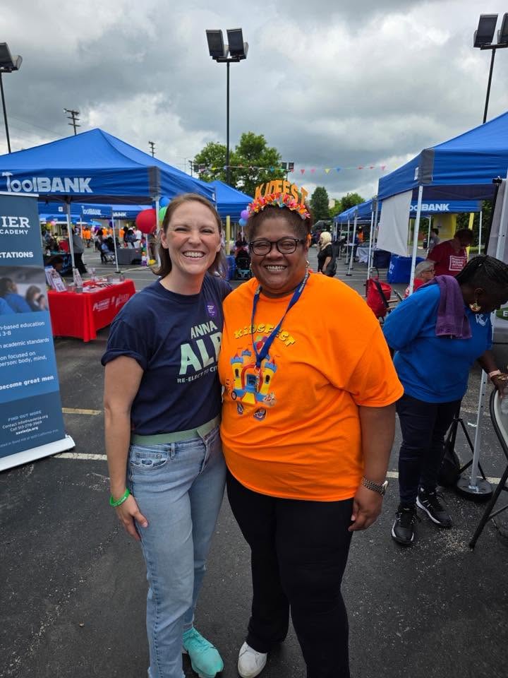 Cincinnati City Council supporter posing with a Brothas Inc. volunteer at 3rd KidsFest