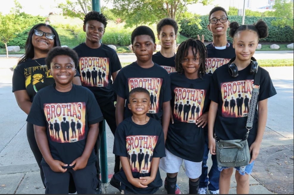 Brothas Inc. youth in Brothas shirts